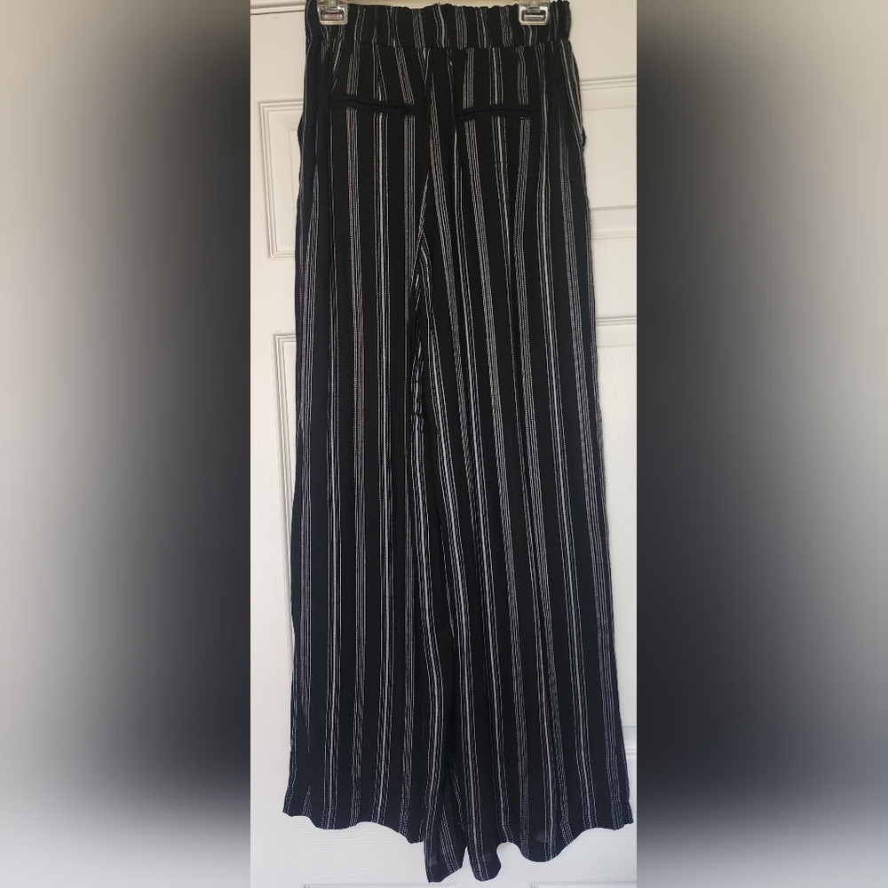 Forever 21 Wide Leg Black with Silver Stripe pants. Size Medium.